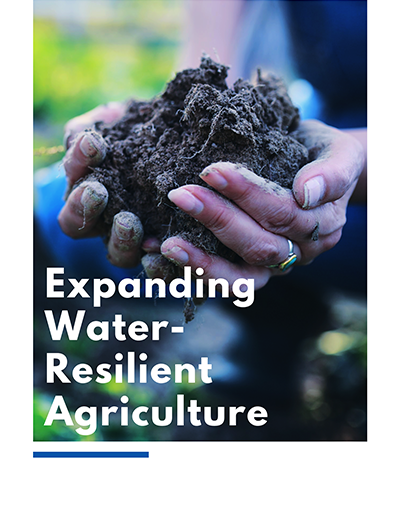 Advancing resiliency through healthy soil programs. Hands holding nutrient rich soil.
