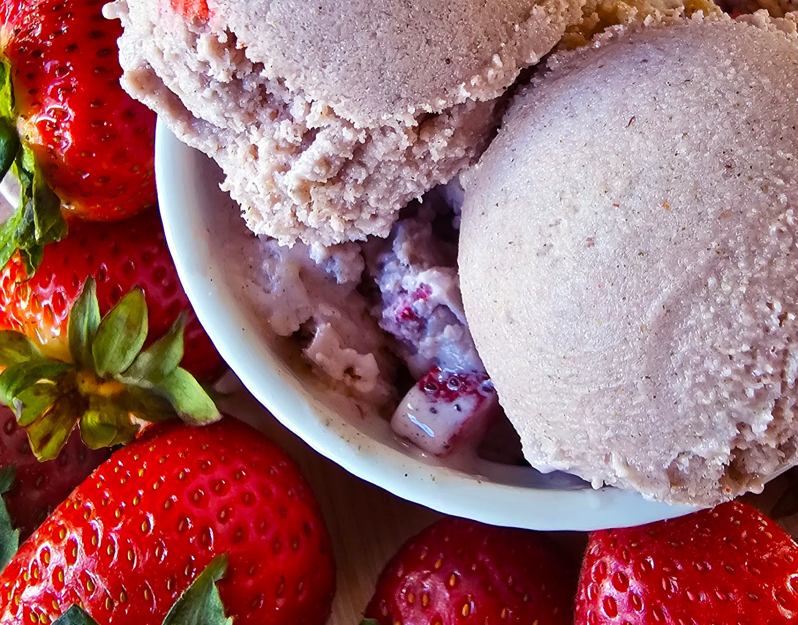 Closeup of strawberry hemp ice cream in a bowl