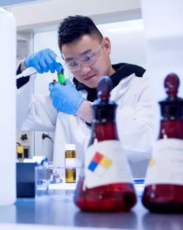 Lab Scientist With Pipette 
