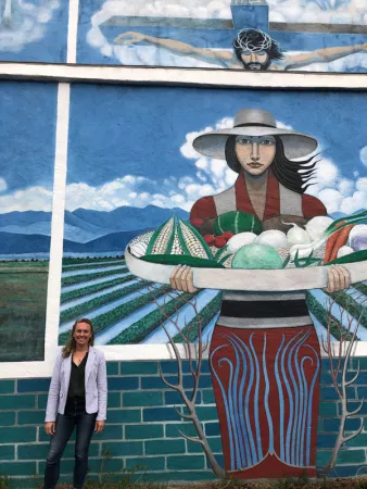 Commissioner Greenberg with a Chicano mural in San Luis, CO