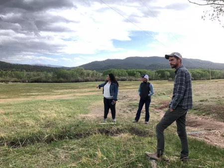 Ronda Lobato discusses the conservation easement on her family’s land with Commissioner Greenberg and Joel Nystrom of Colorado Open Lands