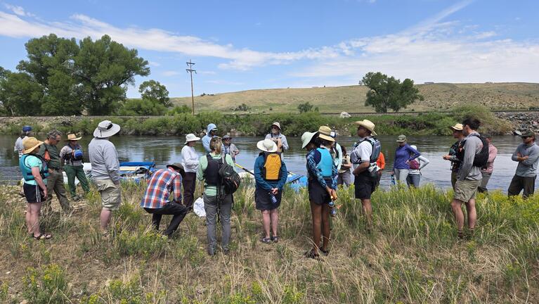 group gathers around Yampa River